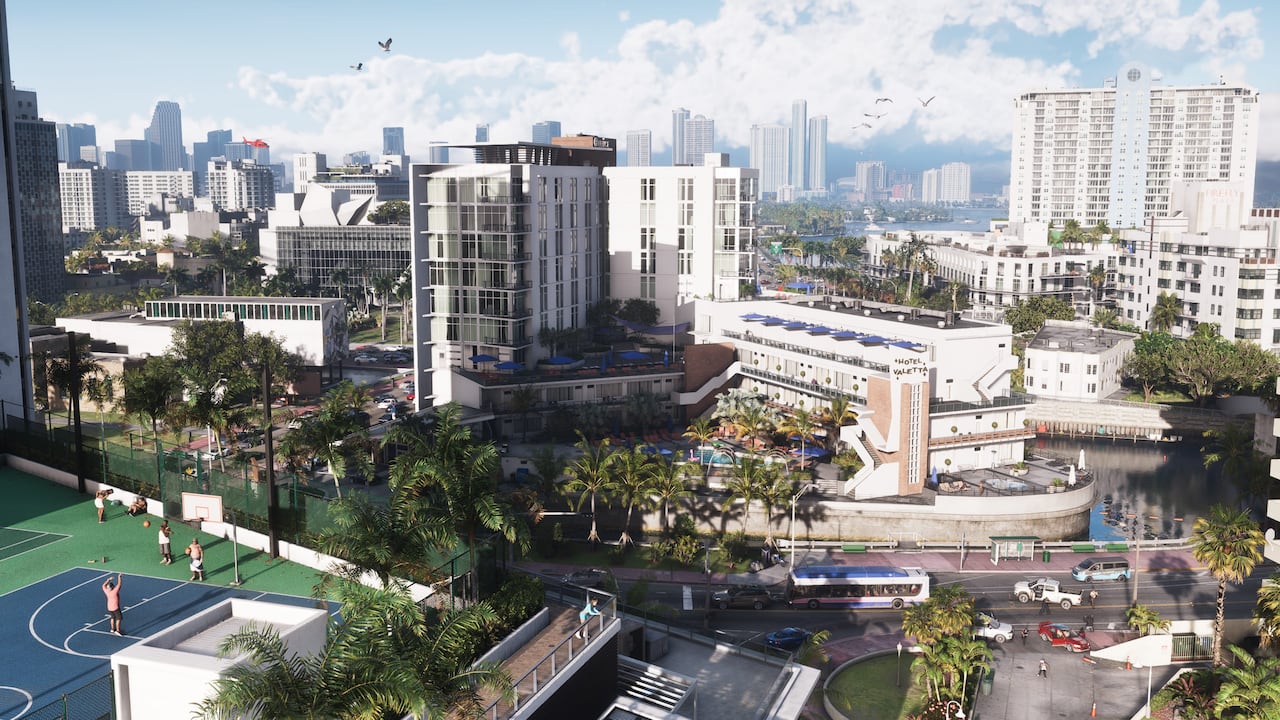 Daylight view across Vice City high-rises and waterfront blocks