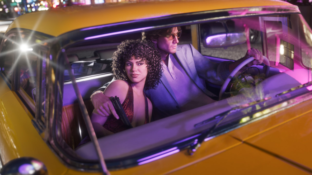 A man in a pale suit and tinted glasses drives a yellow classic car through neon-lit Vice City at night while the woman beside him holds a pistol, in official GTA VI artwork